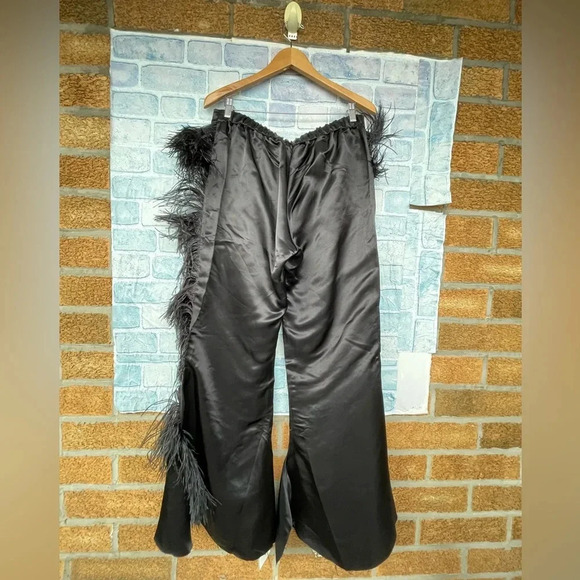 MARQUES' ALMEIDA
Feather-embellished kick-flare satin trousers size 10 - Picture 8 of 16